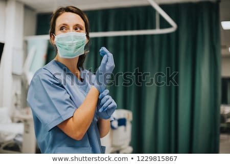 Stock fotó: Practitioner And Female Nurses