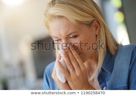 Zdjęcia stock: Sick Woman Blowing Her Nose