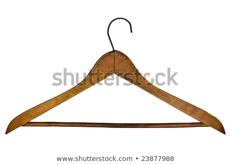 Wooden Clothes Hangers Over Yellow Background Imagine de stoc © RedDaxLuma