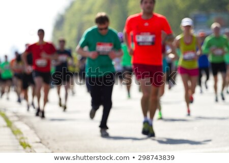 Foto d'archivio: Blur Defocus People Running Marathon