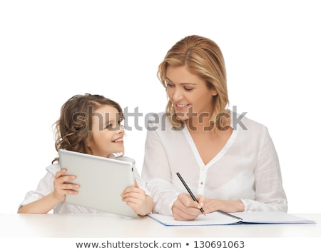 Stockfoto: Mother And Daughter With Tablet Pc Doing Homework