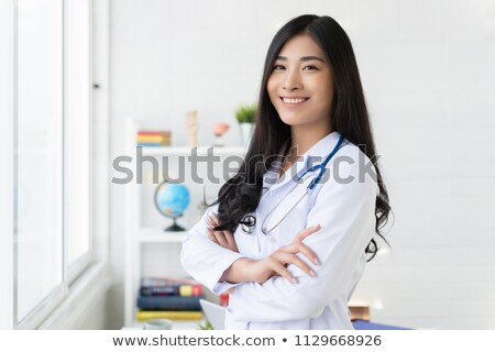 Stock photo: Nurse With A Laptop In The Arms
