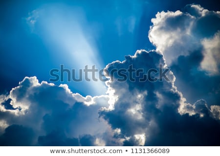 Foto stock: Silver Lined Storm Clouds With Light Rays And Copy Space