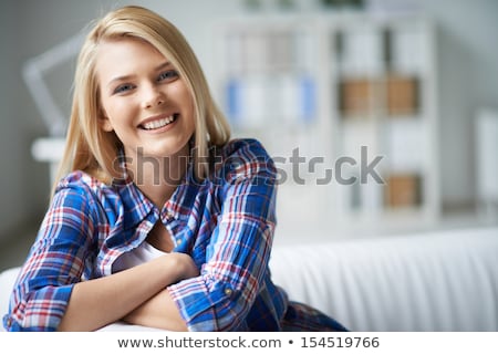 Stock photo: Serene Young Woman With A Gorgeous Smile