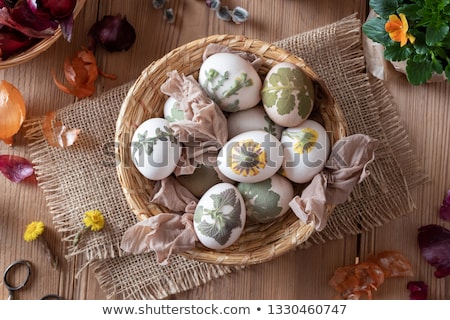 [[stock_photo]]: Preparation Of Easter Eggs For Dying With Onion Peels