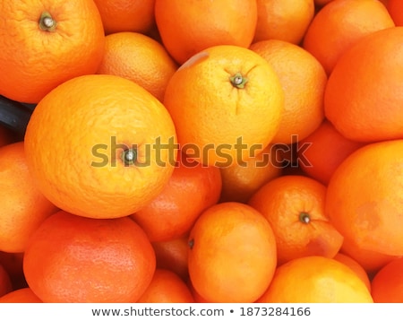 Stockfoto: Close Up Of Mandarins On Slate Table Top