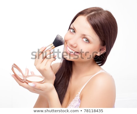 Foto stock: Positive Young Woman Apply Powder With Brush