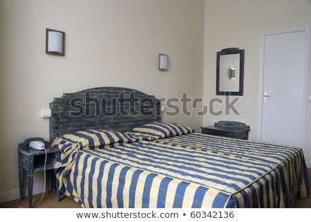 ストックフォト: Three Star Hotel Bed And Pillows