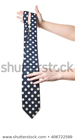 Stock fotó: Man Holding Polka Dot Tie