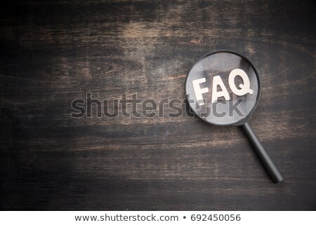 Foto d'archivio: Faq Word And Magnifying Glass