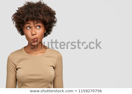 Stockfoto: Attractive African Woman In Black Top Over Dark Background