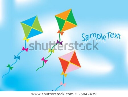 Stok fotoğraf: Three Colorful Kites In The Blue Sky