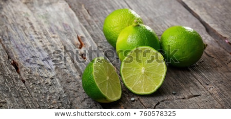 Stockfoto: Fresh Lime On Wood Board Bio Fruit