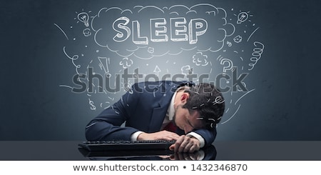 Stock photo: Businessman Fell Asleep At His Workplace With Ideas Sleep And Tired Concept