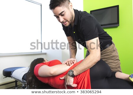 Zdjęcia stock: Physical Therapist Doing Mobilisation Of The Spine