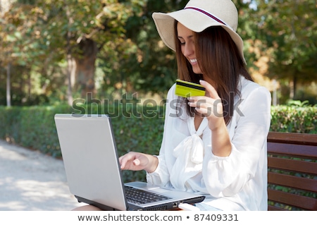 Stockfoto: Young Elegant Woman Wearing Straw Hat And White Dress Holding Cr