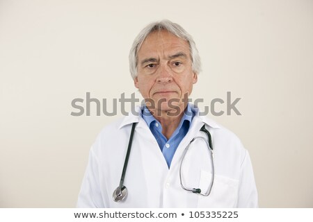 Male Doctor With Serious Expression On Face Imagine de stoc © mangostock