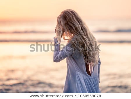 Foto stock: Beautiful Blonde Woman In Blue Bikini