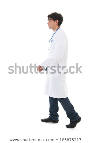 Foto stock: Male Doctor Walking Near By