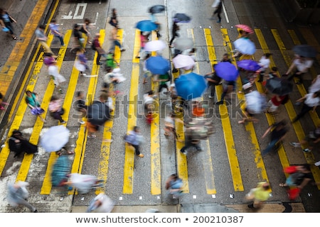 Stockfoto: People Moving At Zebra Crosswalk Hong Kong
