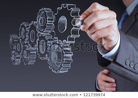 [[stock_photo]]: Business Man Drawing Gear To Success