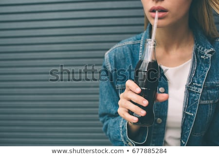 [[stock_photo]]: Girl Drinking Soda With Straw