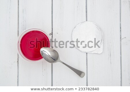 Foto d'archivio: Red And White Food Container For Yogurt