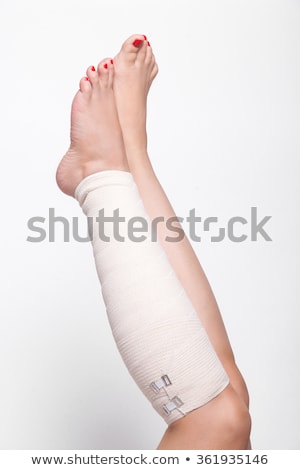 Stok fotoğraf: Ankle Woman Dragged Elastic Bandage