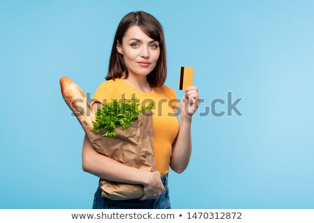 Сток-фото: Pretty Young Consumer With Food Products Showing Her Credit Card