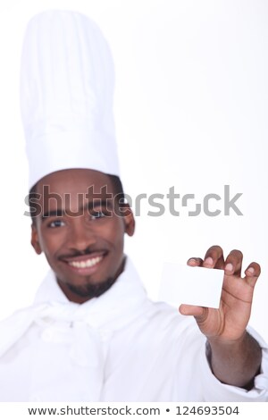 Stock photo: Chef Holding Up His Restaurants Business Card