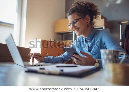 ストックフォト: Businesswoman Using Her Laptop Computer