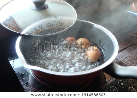 Stock fotó: Eggs In A Saucepan