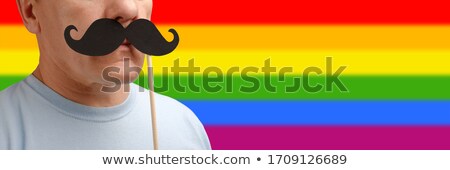 Foto stock: Close Up Of Couple With Gay Pride Rainbow Ribbons