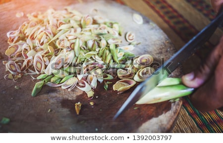 Foto d'archivio: Lemongrass Slices On Wood Background