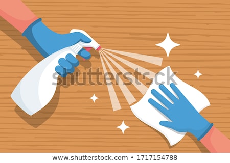 Stock foto: Janitor Cleaning Desk With Napkin