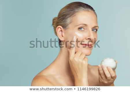 Stock photo: Face Cream Moisturizer Jar On Blue Background Moisturizing Skin