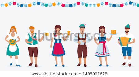 Stockfoto: A Man In A Green Hat With A Feather Plays The Accordion Beer Sausage Pretzel German Oktoberfest