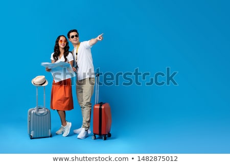 [[stock_photo]]: Tourist Looking A Map