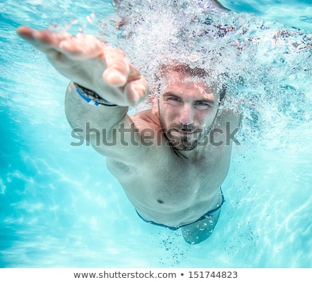 ストックフォト: Handsome Young Man Swimming