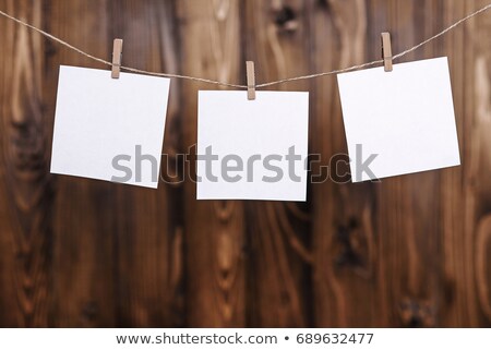 Foto stock: Photo Frames With Pins On Rope