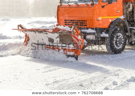 Stok fotoğraf: Truck Cleaning Road In Winter