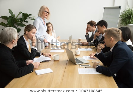 商業照片: Business Meeting And Dismissal Of Worker In Office