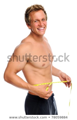 Stock photo: Studio Portrait Of Bare Chested Muscular Young Man