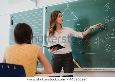 Foto d'archivio: Geometry Class School Teacher And Pupils At Desks