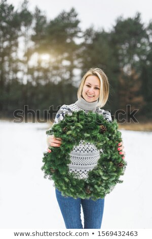 Сток-фото: Woman Holding Christmas Wreath Maked By Herself