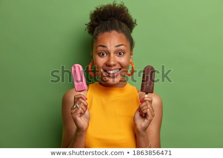 [[stock_photo]]: Photo Of Pretty Pleased Woman In Earrings Posing And Smiling At Camera