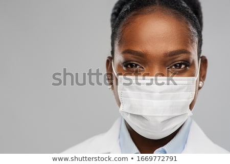 Foto stock: African Female Doctor In Mask