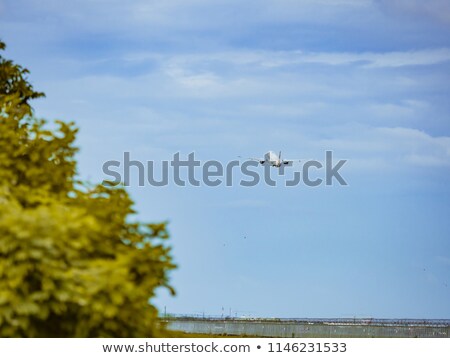 Foto stock: Aircraft In The Clouds After Take Off