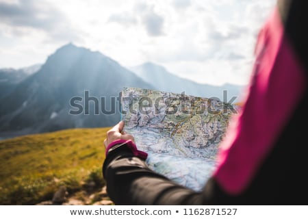 Stock photo: Active Woman Backpack Search Navigation Map