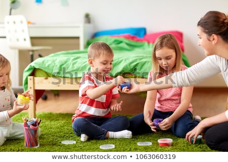 Stock photo: Kids And Mother With Modelling Clay Or Slimes